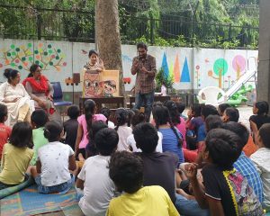 Mottainai Caravan - Library on Wheels' travelling to different locations for conducting Storytelling sessions through the 'Picture Book' and promoting reading habits among children