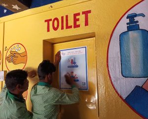 Dissemination of key Messages of Achhi Aadat Campaign through installation of posters in the Public Toilets.